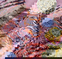 Bovine and Swine Barbeque - St Kilda Accommodation