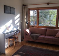 Eco-renovated light-filled house on a hill