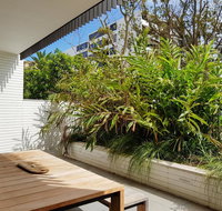 Executive Living in this Chic Garden Apartment - St Kilda Accommodation