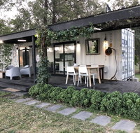 Absolute riverfront shipping container cabin - St Kilda Accommodation